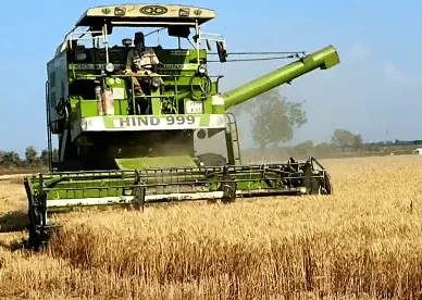 COMBINES HARVESTERS